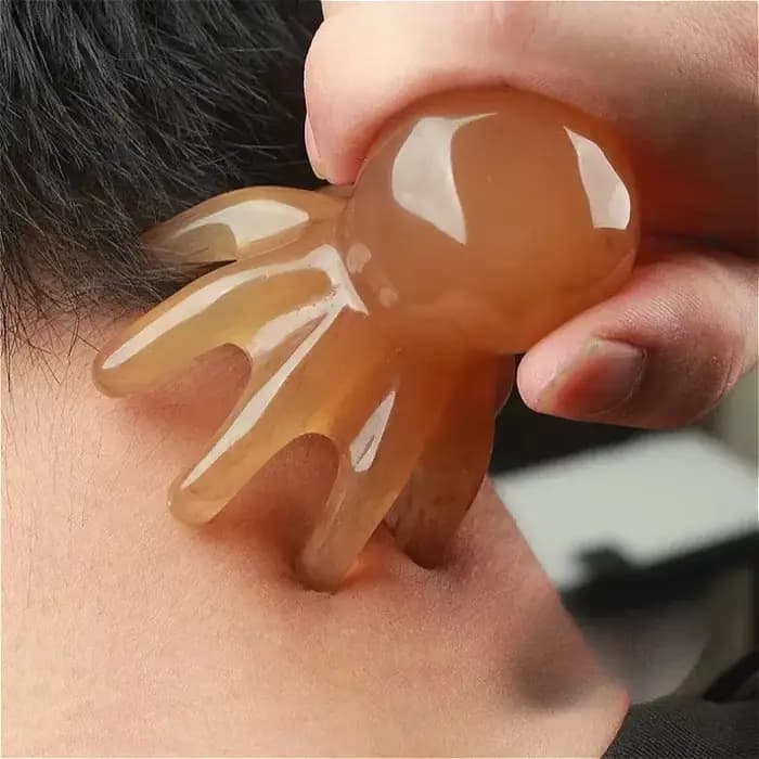 Peigne de massage en résine en forme de pieuvre pour le grattage des méridiens