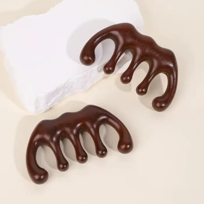 Peigne de massage en bois pour la tête
