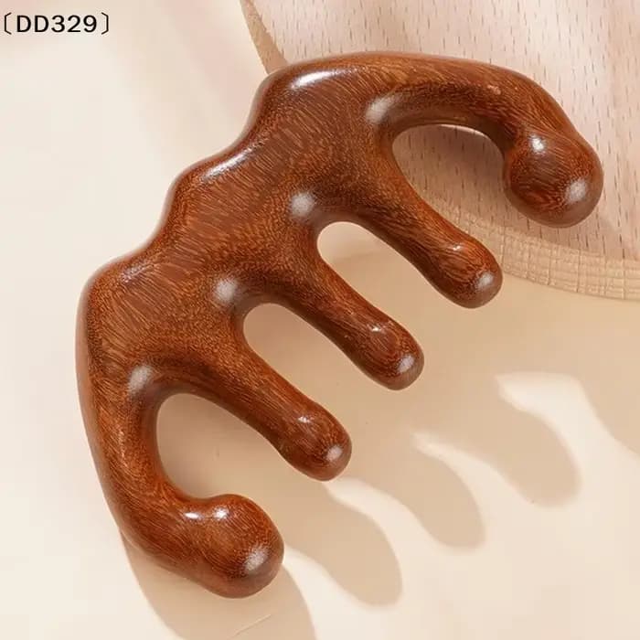 Peigne de massage thérapeutique pour la tête