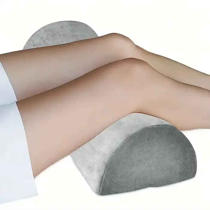 Oreiller demi-lune pour jambes
