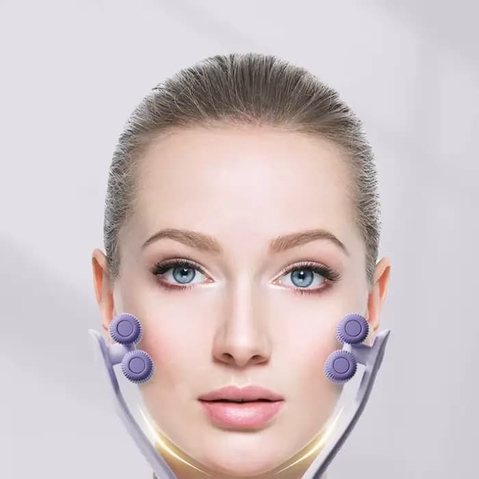 Masseur facial à rouleaux portable multifonctionnel favorisant l'absorption des produits
