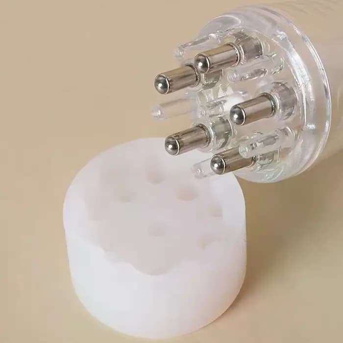 Peigne applicateur de sérum pour le cuir chevelu